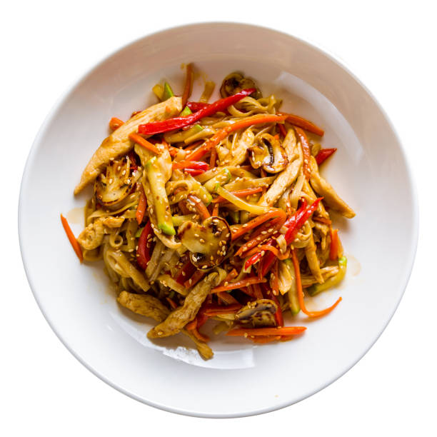 istock chicken wok noodles with vegetables isolated on white background top view 1436266228