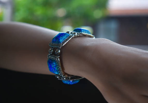 Close-up, ring, black background. Sapphire, Tanzanite or Topaz.