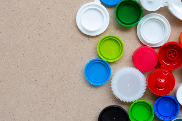 istock Colorful plastic bottle caps and plastic glass lid 1436272282