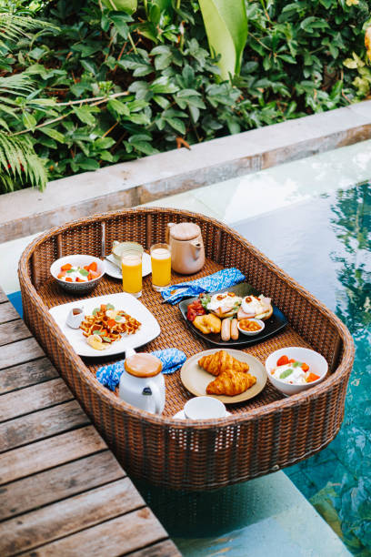 istock Breakfast tray is floating on the swimming pool 1436272551