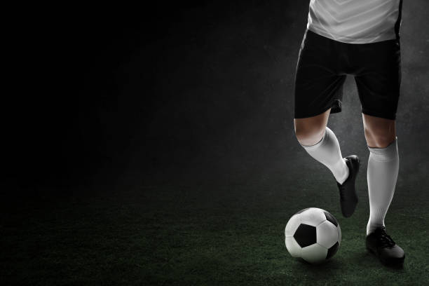 istock Professional soccer player in action 1436274850