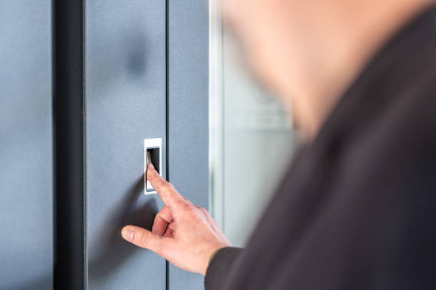 istock Unlocking modern house doors by fingerprint authorisation 1436278181
