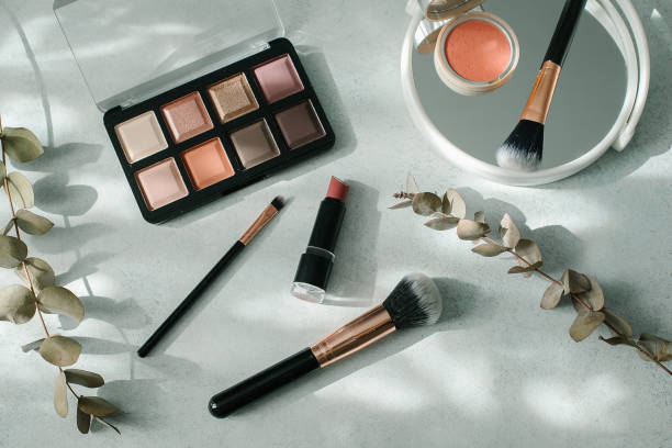 istock Makeup brushes and cosmetics on light background. Beauty, fashion concept. 1436279257