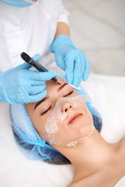 istock face of woman while procedure ultrasonic cleansing 1436279703