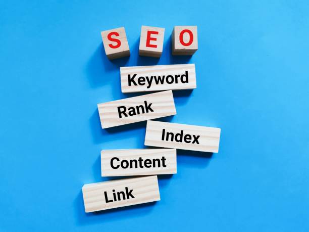 istock SEO process information written on wooden blocks against blue background. 1436282275