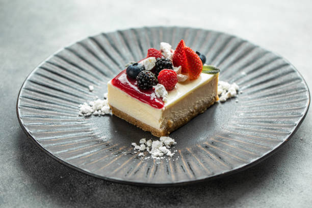 istock black bowl and Cheesecake Cake, strawberry cheesecake in black ceramic dish. 1436284969