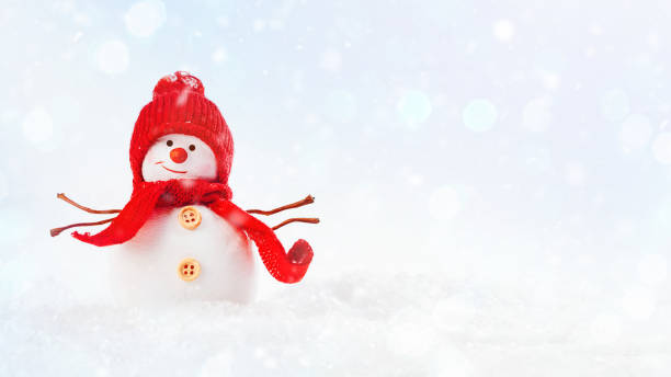istock Snowman in a red hat with a red scarf in the snow on a light background. Glitter background.New Year's card background.Copy space.Christmas home decor.New Year concept.Simple minimalistic. 1436285208