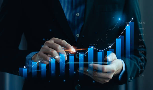 istock business analysis financial investment and technology concepts Developing for success and growing up Analyze financial charts on with mobile on a virtual screen. business technology background 1436286932