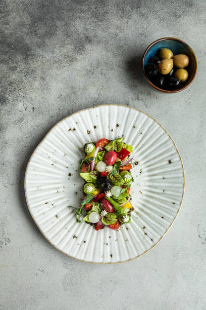 istock white plate and fruit salad, Fresh fruit salad on white background, 1436291371
