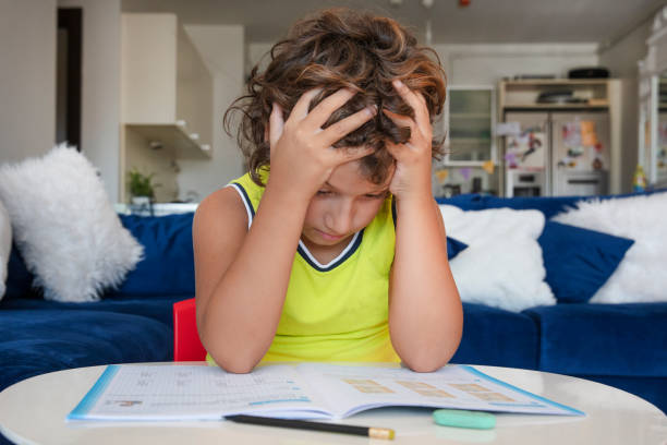 istock School child . Learning difficulties, education concept, studying at home 1436291427