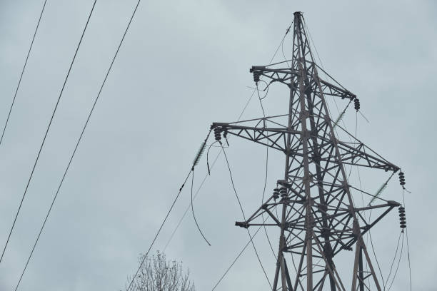 istock Power mast for high voltage electricity pylon with cables in nice landscape 1436291572