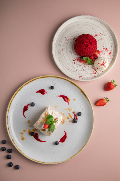 istock Goat cheese mousse and View from above of a stone table and pink background 1436291671