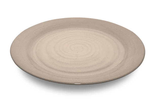 istock Brown circle ceramics plate isolated on white background. 1436291755