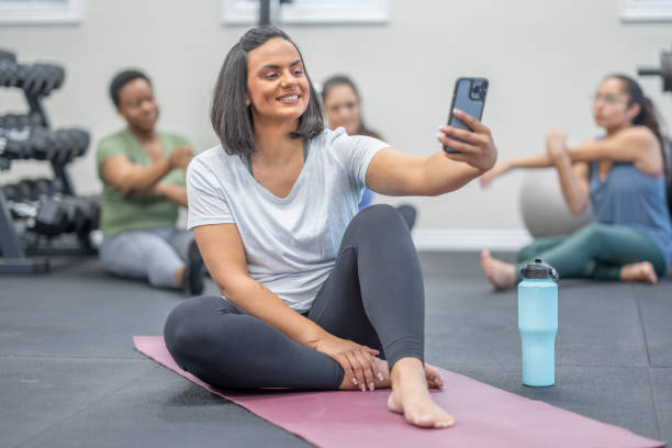 istock Woman Taking a Selfie at the Gym 1436304919