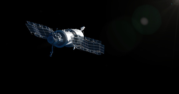 Hovering satellite on a black background with a copy space for a space topics and designs.3D rendered satelite on a black background. Satellite levitating in an outer space