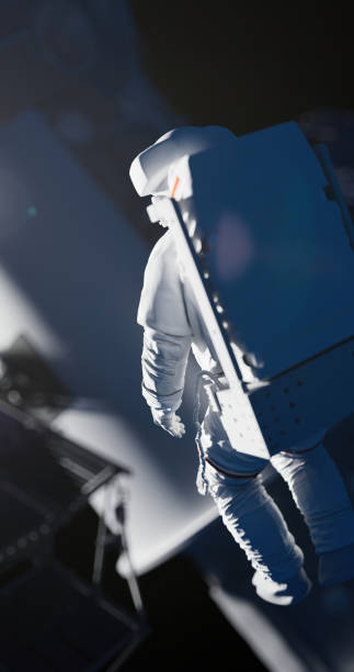 istock Astronaut in a white space suit works with a spaceship in an outer space 1436307875