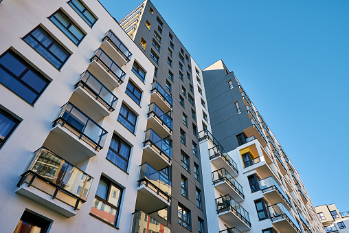 A residential condominium building on a sunny day.  