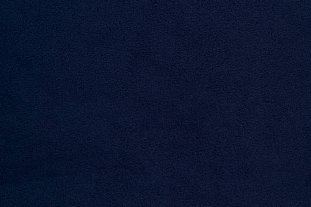 istock Fleece fabric blue top view. Texture of textile fleece bedspread. 1436314288