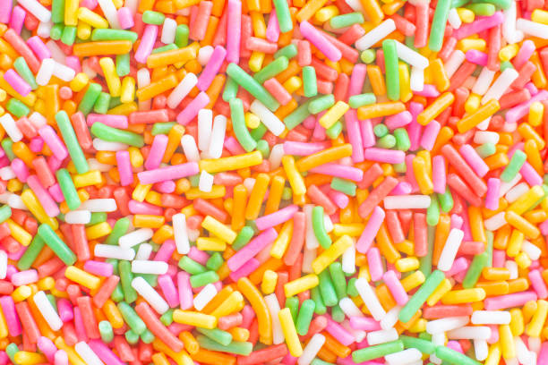 istock Colorful rainbow sprinkles sugar texture pattern background. for cake , bakery and ice-cream or other 1436314876