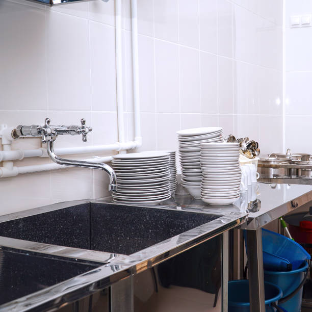 istock Clean washed dishes in the kitchen of restaurant or cafe 1436315727
