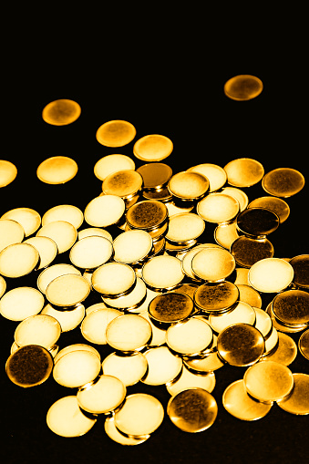 Coins isolated on black background