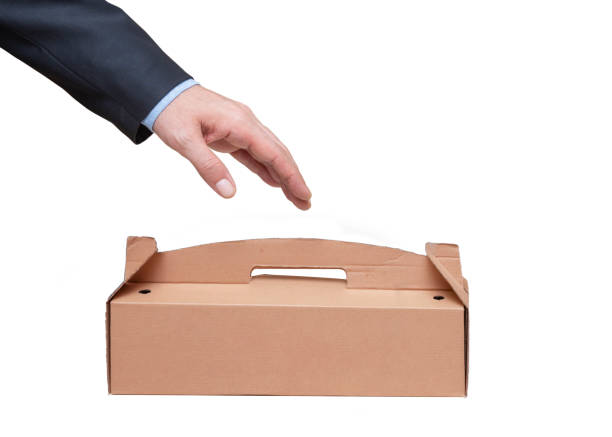 istock Hand holding cardboard takeaway food box 1436323586