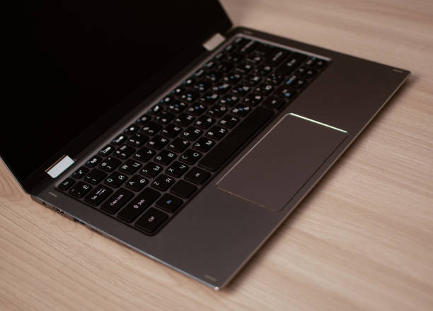 istock Open laptop on a wooden table. 1436324494