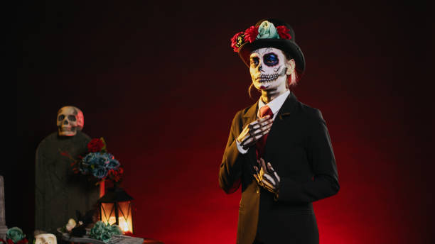 istock Lady santa muerte with suit and hat looking creepy 1436324594