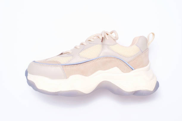 istock Trendy sneaker on a white background close-up top view. 1436325483
