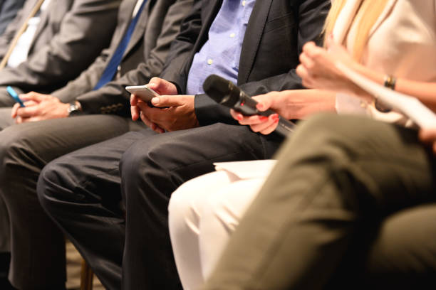 istock Midsection of participants at conference 1436327297