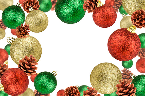 Levitation of Christmas shiny balls and cones isolated on white background.