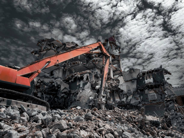 istock Building House Demolition site Excavator with hydraulic crasher machine. 1436330731