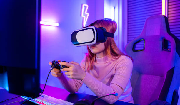 istock Gamer in VR headset glasses exploring metaverse play video game online with joystick 1436331084