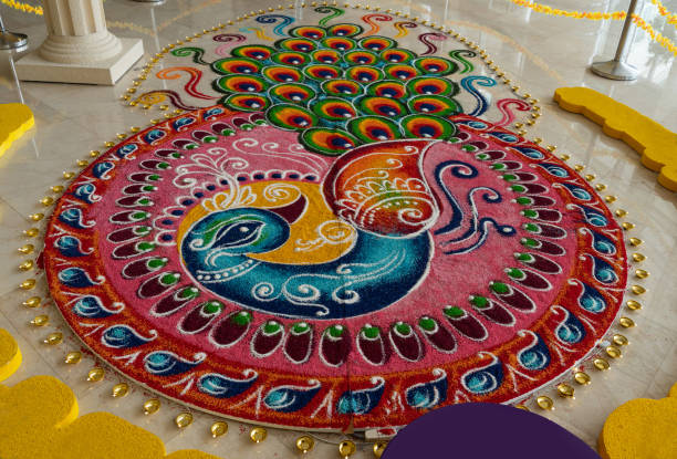 Beautiful colorful Indian traditional rangoli decoration for Diwali or Deepavali celebration stock photo