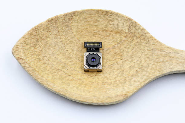 istock A mobile phone camera on a wooden spoon 1436332981