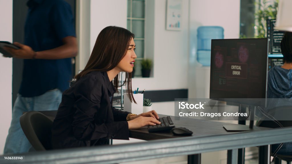 Asian It Engineer Encountering System Failure Error On Computer Stock ...