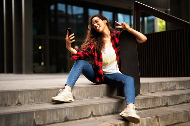 istock Young modern happy woman having fun outside. 1436335098