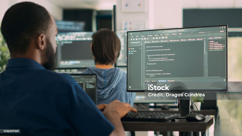 African American System Engineer Working On Software Development With ...
