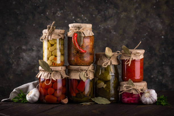 istock Pickled vegetables in glass jars. 1436338897