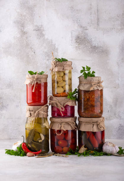 istock Pickled vegetables in glass jars. 1436338966
