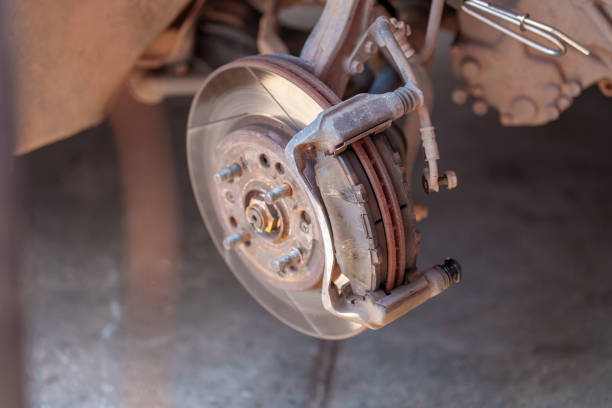 istock auto mechanic repairman changing wheel and tire in a workshop 1436339237