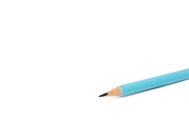 istock simple pencil lying on a white background close-up. Graphite pencil isolated on white background. 1436344891