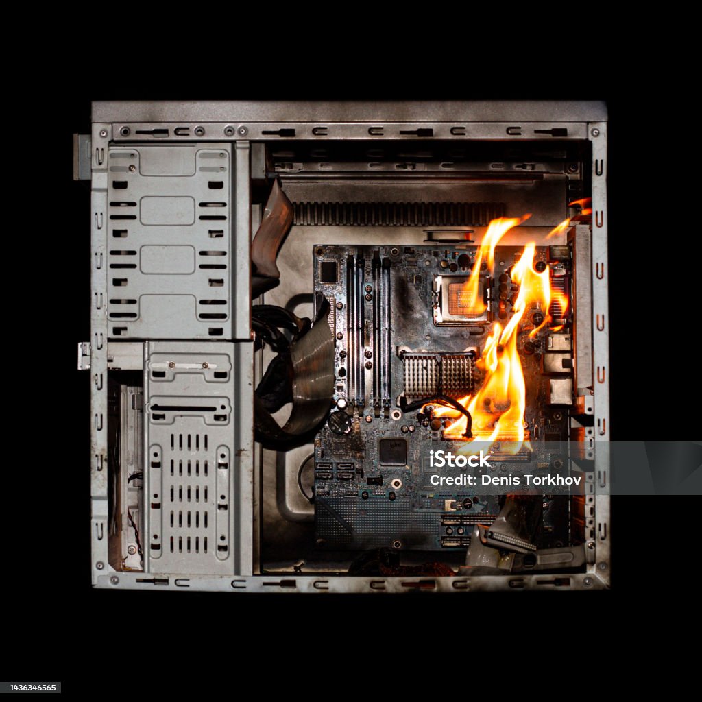 Computer And Power Surges A Burning System Unit From A Computer From A Short Circuit And A Power ...