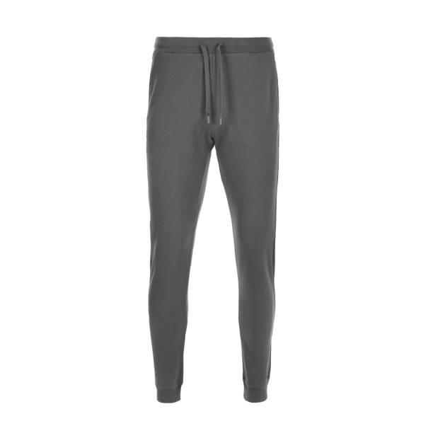 Lower part of the men's gray tracksuit Lower part of the men's gray tracksuit	isolated on a white background. Ghost photography technique. jogging pants stock pictures, royalty-free photos & images