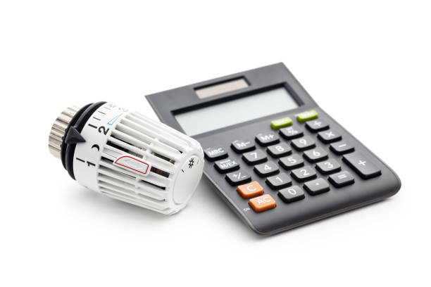 Thermostatic valve head with calculator isolated on a white background.