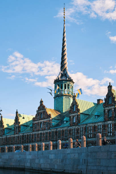 Copenhagen, Denmark - Sept 2022: View of Borsen Stock Exchange building and its spire with shaped as the tails of four dragons twined together (Borsbygningen)