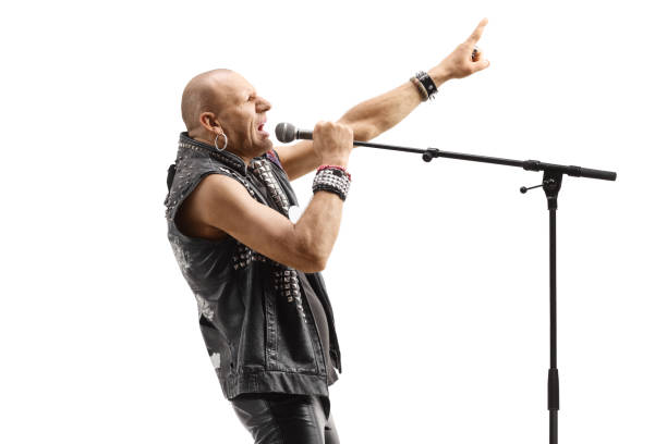 istock Profile shot of a rock star singer singing on a microphone 1436356090