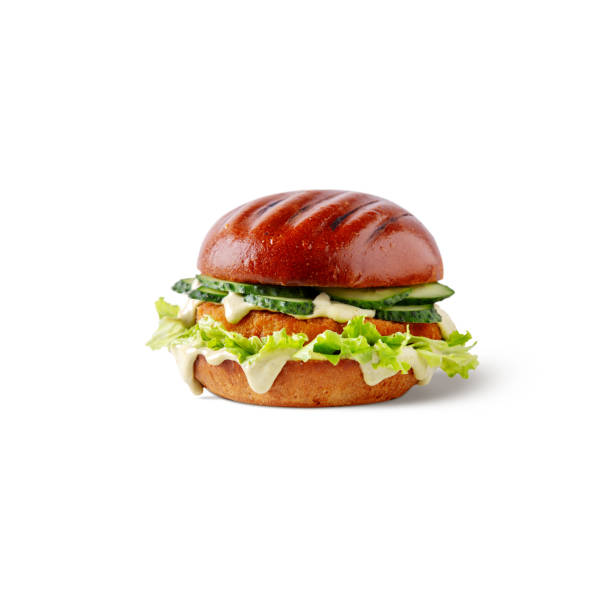 istock Hamburger with sauce, chicken cutlet, salad and cucumber on a white background 1436356479