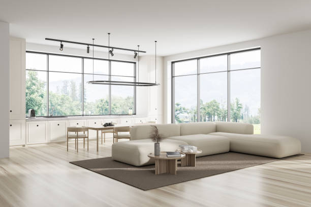 istock Stylish studio interior with rest and eating area with panoramic window 1436358928