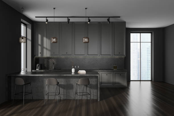 istock Grey kitchen interior with bar countertop and seats, kitchenware and window 1436360339